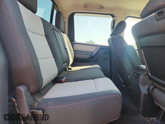 2012 Nissan Titan SL with VIN 1N6BA0EC9CN324495, listed as a Copart auction lot 60982445 with 142,430 mi miles and Salvage title. Bid and sale history available at DreamBid. Image 10.