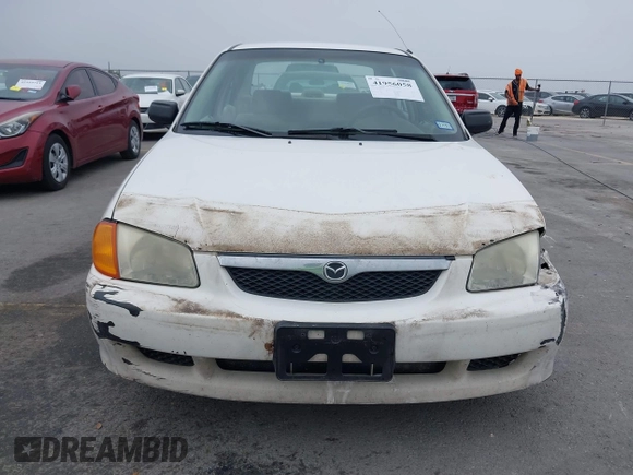 2000 Mazda Protege DX with VIN JM1BJ2220Y0273953, listed as a IAAI auction lot 41956058 with 158,837 mi miles and . Bid and sale history available at DreamBid. Image 17.