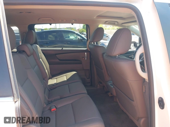 2016 Honda Odyssey EX-L with VIN 5FNRL5H62GB048406, listed as a IAAI auction lot 42145352 with 126,938 mi miles and . Bid and sale history available at carsss.com. Image 8.