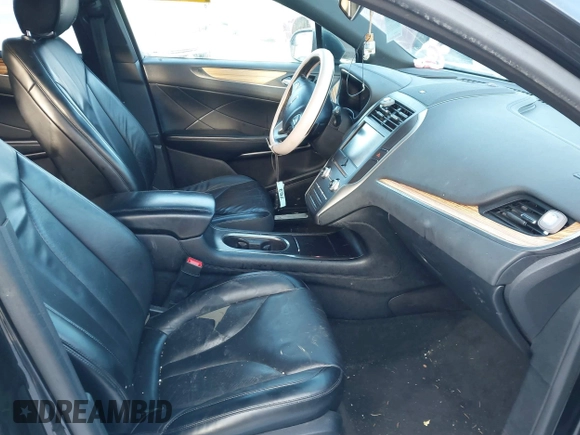 2015 Lincoln MKC with VIN 5LMTJ2AHXFUJ01440, listed as a IAAI auction lot 41526975 with 104,280 mi miles. Bid and sale history available at carsss.com. Image 5.