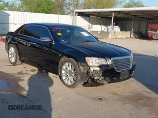 2011 Chrysler 300 with VIN 2C3CA6CT8BH595198, listed as a IAAI auction lot 41983417 with 182,067 mi miles. Bid and sale history available at carsss.com. Image 1.