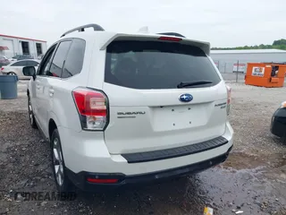 2017 Subaru Forester Touring with VIN JF2SJAWCXHH501702, listed as a IAAI auction lot 42080564 with 188,392 mi miles and . Bid and sale history available at DreamBid. Image 3.