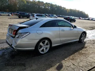 2012 Mercedes-Benz E 550 with VIN WDDKJ7DB2CF151973, listed as a Copart auction lot 82667474 with 130,590 mi miles and Salvage Title. Bid and sale history available at DreamBid. Image 3.