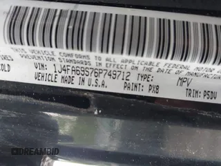 2006 Jeep Wrangler Rubicon z VIN 1J4FA69S76P749712, wystawiony jako IAAI lot #42240375 z przebiegiem 75 405 mil mil oraz . Historia ofert i sprzedaży dostępna na DreamBid. Obrazek 9.
