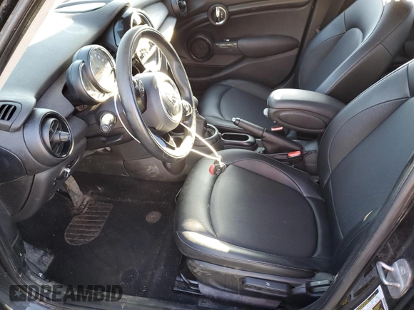 2016 MINI Hardtop 4 Door with VIN WMWXU1C50G2D09465, listed as a Copart auction lot 54975005 with 62,715 mi miles and Salvage Title. Bid and sale history available at DreamBid. Image 7.