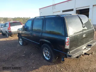 1997 Chevrolet Tahoe with VIN 1GNEK13R9VJ428657, listed as a IAAI auction lot 41324736 with 250,008 mi miles. Bid and sale history available at carsss.com. Image 3.