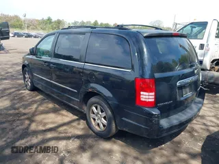 2010 Chrysler Town & Country Touring with VIN 2A4RR5D12AR359509, listed as a IAAI auction lot 42178261 with 160,707 mi miles and . Bid and sale history available at DreamBid. Image 3.