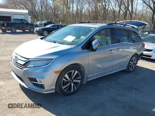 2018 Honda Odyssey Elite z VIN 5FNRL6H96JB004853, wystawiony jako IAAI lot #41877946 z przebiegiem 125 580 mil mil oraz . Historia ofert i sprzedaży dostępna na DreamBid. Obrazek 2.