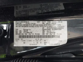 2012 Ford Focus SE with VIN 1FAHP3F25CL446064, listed as a IAAI auction lot 41883353 with 142,468 mi miles. Bid and sale history available at carsss.com. Image 9.