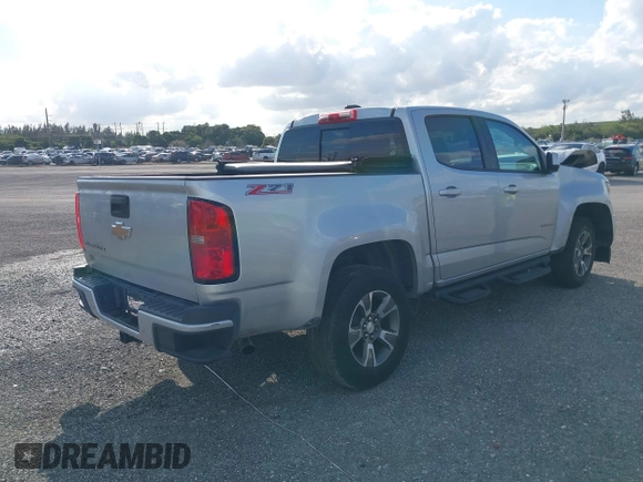 2019 Chevrolet Colorado 2WD Z71 with VIN 1GCGSDEN6K1330906, listed as a IAAI auction lot 40058453 with 116,053 mi miles. Bid and sale history available at carsss.com. Image 4.