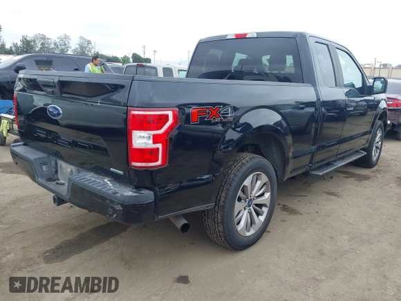 2018 Ford F-150 XL with VIN 1FTEX1EP6JKF59667, listed as a IAAI auction lot 42410311 with 134,385 mi miles and . Bid and sale history available at DreamBid. Image 4.