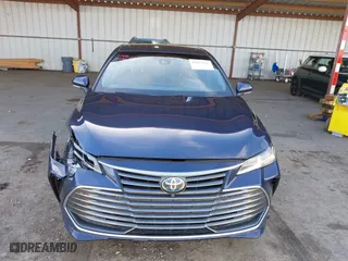 2019 Toyota Avalon Hybrid Limited with VIN 4T1B21FB5KU007633, listed as a IAAI auction lot 41615161 with 132,182 mi miles. Bid and sale history available at carsss.com. Image 12.