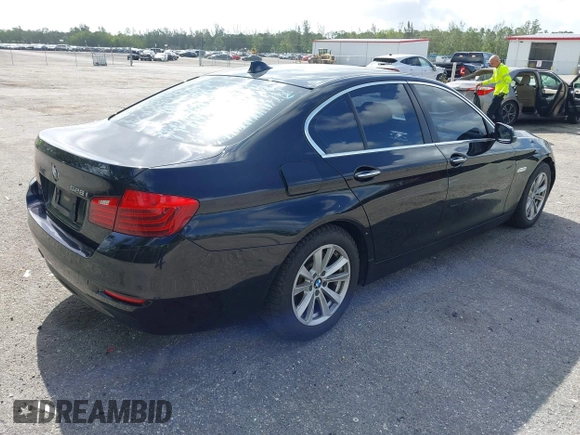2015 BMW 5 Series 528i with VIN WBA5A5C57FD512845, listed as a IAAI auction lot 41954256 with 174,944 mi miles. Bid and sale history available at carsss.com. Image 4.