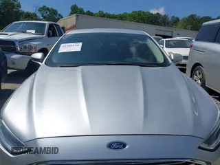 2017 Ford Fusion SE z VIN 3FA6P0HDXHR238713, wystawiony jako IAAI lot #42304140 z przebiegiem 157 630 mil mil oraz . Historia ofert i sprzedaży dostępna na DreamBid. Obrazek 12.