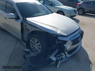 2014 Infiniti Q50 with VIN JN1BV7AP4EM677506, listed as a IAAI auction lot 40113207 with 142,446 mi miles. Bid and sale history available at carsss.com. Image 6.