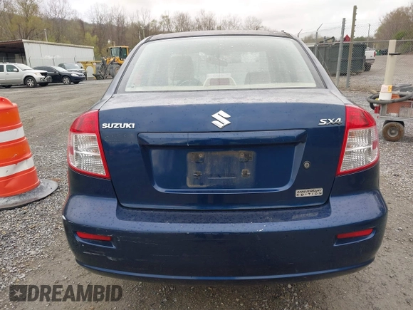 2011 Suzuki SX4 LE with VIN JS2YC5A23B6304713, listed as a IAAI auction lot 41997287 with 114,024 mi miles. Bid and sale history available at carsss.com. Image 16.