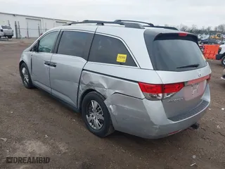 2014 Honda Odyssey LX with VIN 5FNRL5H22EB026657, listed as a IAAI auction lot 41114634 with 132,125 mi miles. Bid and sale history available at carsss.com. Image 3.