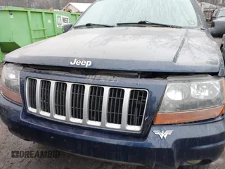 2004 Jeep Grand Cherokee Laredo with VIN 1J4GW48N04C220886, listed as a IAAI auction lot 41473522 with 146,156 mi miles. Bid and sale history available at carsss.com. Image 6.