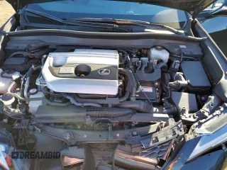 2021 Lexus UX with VIN JTHE9JBH0M2036963, listed as a Copart auction lot 82687744 with 24,857 mi miles and Salvage Title. Bid and sale history available at carsss.com. Image 12.