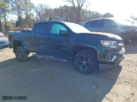 2015 Chevrolet Colorado 4WD Z71 with VIN 1GCGTCE31F1163947, listed as a IAAI auction lot 40997814 with 101,884 mi miles. Bid and sale history available at carsss.com. Image 1.