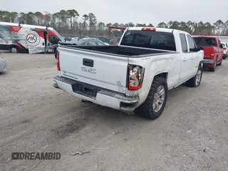 2019 GMC Sierra 1500 Limited with VIN 2GTR1LECXK1223212, listed as a IAAI auction lot 41166361 with 114,197 mi miles. Bid and sale history available at carsss.com. Image 4.