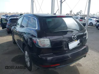 2011 Mazda CX-7 i Touring with VIN JM3ER2CM0B0402889, listed as a IAAI auction lot 42040829 with 134,836 mi miles. Bid and sale history available at carsss.com. Image 3.