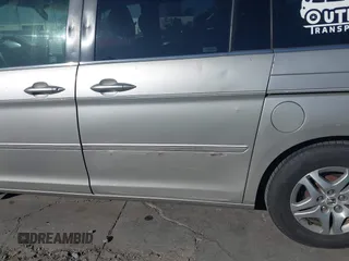 2005 Honda Odyssey EX-L z VIN 5FNRL38635B416982, wystawiony jako IAAI lot #42337383 z przebiegiem 350 647 mil mil oraz . Historia ofert i sprzedaży dostępna na DreamBid. Obrazek 6.