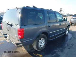 1998 Ford Expedition XLT with VIN 1FMRU1763WLB16405, listed as a IAAI auction lot 41311254 with 265,781 mi miles. Bid and sale history available at carsss.com. Image 4.