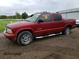 2002 GMC Sonoma SLS with VIN 1GTDT13W62K203061, listed as a Copart auction lot 83095774 with 136,118 mi miles and Salvage Title. Bid and sale history available at carsss.com. Image 1.