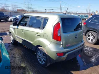 2012 Kia Soul + with VIN KNDJT2A65C7403543, listed as a IAAI auction lot 41633273 with 128,988 mi miles. Bid and sale history available at carsss.com. Image 3.