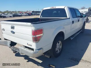 2013 Ford F-150 XL with VIN 1FTFW1CF7DFA66868, listed as a IAAI auction lot 41784163 with 218,303 mi miles. Bid and sale history available at carsss.com. Image 4.