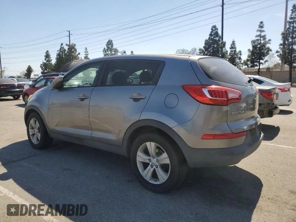 2012 Kia Sportage LX with VIN KNDPB3A22C7286908, listed as a Copart auction lot 58220115 with 171,114 mi miles and Clean title. Bid and sale history available at DreamBid. Image 2.