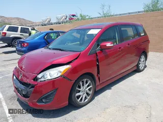 2015 Mazda 5 Grand Touring with VIN JM1CW2DL6F0190312, listed as a IAAI auction lot 42433782 with 79,140 mi miles and . Bid and sale history available at DreamBid. Image 17.