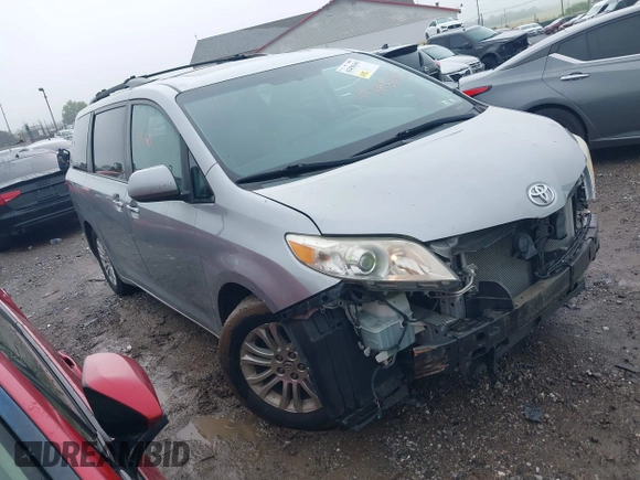 2015 Toyota Sienna XLE с VIN 5TDYK3DC3FS579087, выставлен на аукционе IAAI как лот 42456365 с пробегом 127 350 миль миль и . История ставок и продаж доступна на DreamBid. Изображение 1.