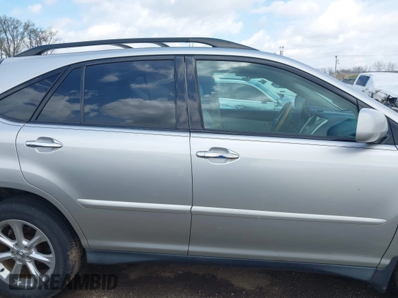 2008 Lexus RX with VIN 2T2HK31U58C053306, listed as a IAAI auction lot 42066973 with 184,266 mi miles. Bid and sale history available at carsss.com. Image 13.