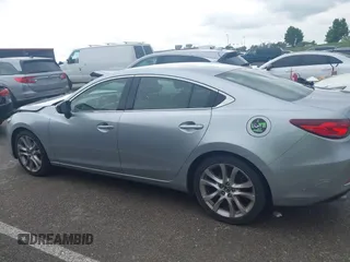 2016 Mazda 6 i Touring with VIN JM1GJ1V57G1434250, listed as a IAAI auction lot 42241857 with 68,011 mi miles and . Bid and sale history available at DreamBid. Image 14.