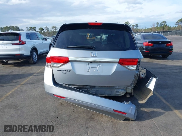 2017 Honda Odyssey EX-L with VIN 5FNRL5H64HB017661, listed as a IAAI auction lot 41719447 with 99,895 mi miles and . Bid and sale history available at DreamBid. Image 16.