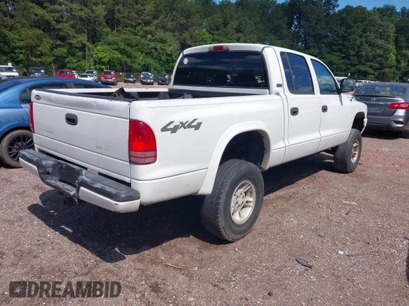 2000 Dodge Dakota Sport z VIN 1B7GG2AN2YS636449, wystawiony jako IAAI lot #42154548 z przebiegiem 186 126 mil mil oraz . Historia ofert i sprzedaży dostępna na DreamBid. Obrazek 4.