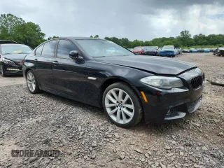 2013 BMW 5 Series 550i xDrive with VIN WBAFU9C55DDY72065, listed as a Copart auction lot 63023675 with 117,592 mi miles and Salvage title. Bid and sale history available at DreamBid. Image 4.