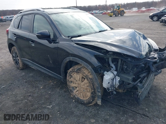 2016 Mazda CX-5 Touring with VIN JM3KE4CY7G0602267, listed as a IAAI auction lot 41854213 with 134,170 mi miles and . Bid and sale history available at carsss.com. Image 1.