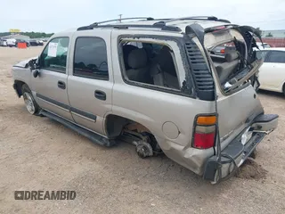 2004 Chevrolet Tahoe LT with VIN 1GNEC13Z84R284127, listed as a IAAI auction lot 42172575 with 230,975 mi miles and . Bid and sale history available at DreamBid. Image 3.