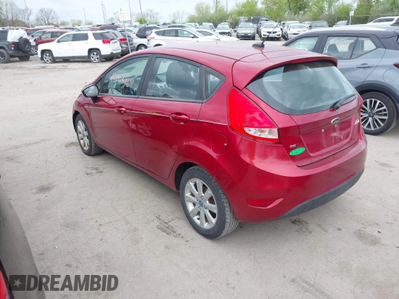 2013 Ford Fiesta SE with VIN 3FADP4EJXDM152463, listed as a IAAI auction lot 42122969 with 66,952 mi miles and . Bid and sale history available at DreamBid. Image 3.