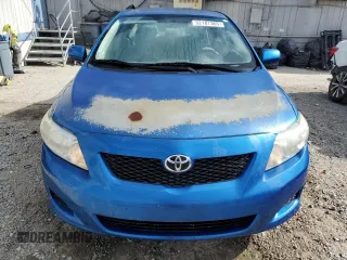 2010 Toyota Corolla z VIN 1NXBU4EE0AZ174665, wystawiony jako Copart lot #52187365 z przebiegiem 121 769 mil mil oraz Szkoda całkowita • Salvage title. Historia ofert i sprzedaży dostępna na DreamBid. Obrazek 5.
