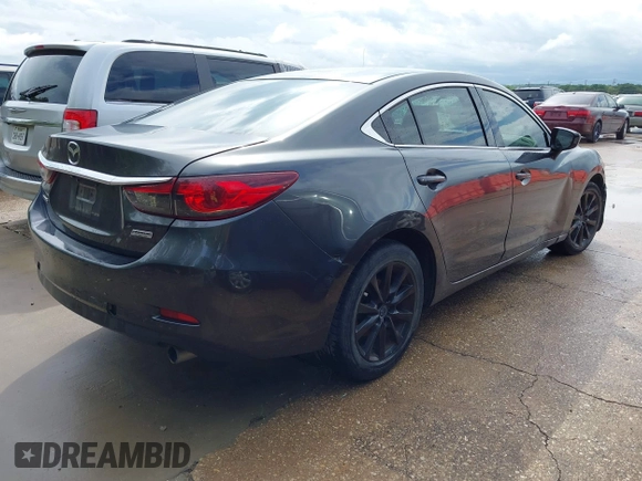 2014 Mazda 6 i Sport with VIN JM1GJ1U66E1129233, listed as a IAAI auction lot 42045330 with 195,071 mi miles and . Bid and sale history available at carsss.com. Image 4.