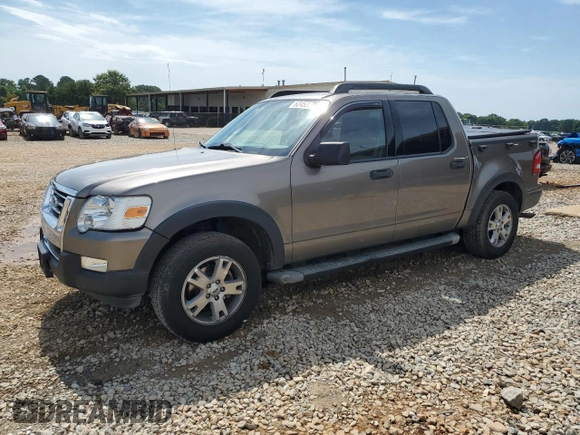 2007 Ford Explorer Sport Trac XLT z VIN 1FMEU31K37UA25095, wystawiony jako Copart lot #62453555 z przebiegiem 133 051 mil mil oraz Szkoda całkowita • Salvage title. Historia ofert i sprzedaży dostępna na DreamBid. Obrazek 1.