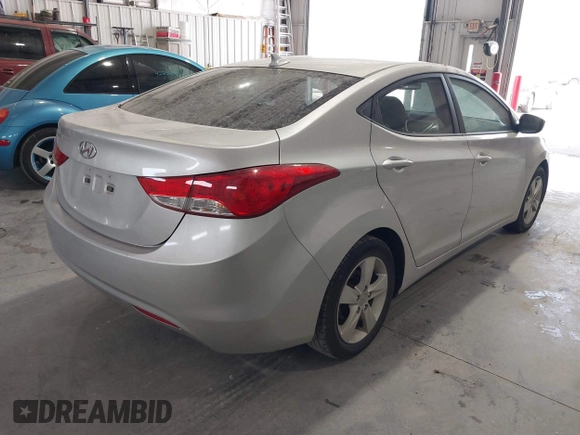 2012 Hyundai Elantra GLS z VIN KMHDH4AE1CU401688, wystawiony jako IAAI lot #42280367 z przebiegiem 90 948 mil mil oraz . Historia ofert i sprzedaży dostępna na DreamBid. Obrazek 4.