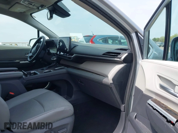 2021 Toyota Sienna XLE with VIN 5TDJSKFC2MS007191, listed as a IAAI auction lot 41945058 with 50,120 mi miles and . Bid and sale history available at DreamBid. Image 5.