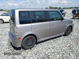 2006 Scion xB z VIN JTLKT324564100800, wystawiony jako Copart lot #56410185 z przebiegiem 205 113 mil mil oraz Szkody całkowita. Historia ofert i sprzedaży dostępna na DreamBid. Obrazek 3.
