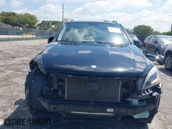 2015 Mercedes-Benz M 400 with VIN 4JGDA5GB4FA559004, listed as a IAAI auction lot 41932299 with 84,749 mi miles and . Bid and sale history available at DreamBid. Image 6.