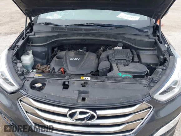 2016 Hyundai Santa Fe z VIN 5XYZU3LB0GG318165, wystawiony jako IAAI lot #42158474 z przebiegiem 74 420 mil mil oraz . Historia ofert i sprzedaży dostępna na DreamBid. Obrazek 10.